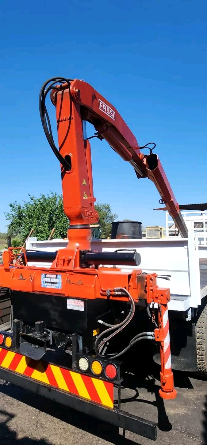 Truck-mounted hydraulic crane serviced by North West Jacks